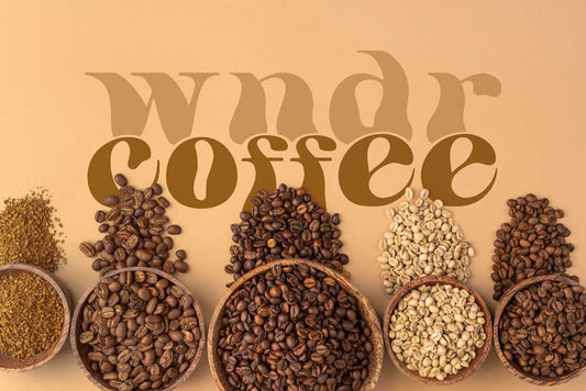 coffee beans in bowls on a tan background with Wndr Coffee logo