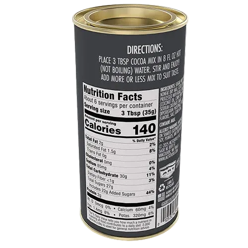 A cylindrical metal canister of cocoa mix shown from the back, featuring a black label with gold-toned rim and a printed nutrition facts panel and directions.