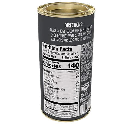 A cylindrical metal canister of cocoa mix shown from the back, featuring a black label with gold-toned rim and a printed nutrition facts panel and directions.